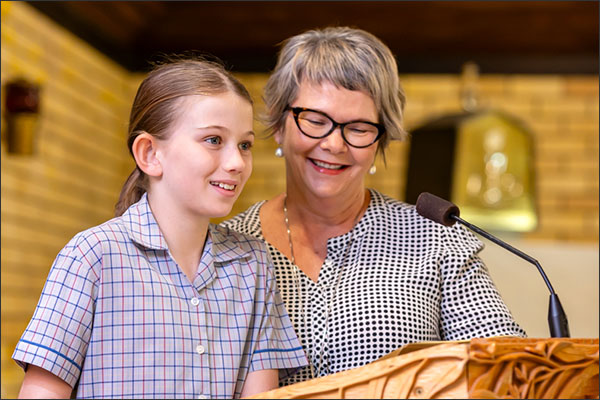Student with teacher in the church