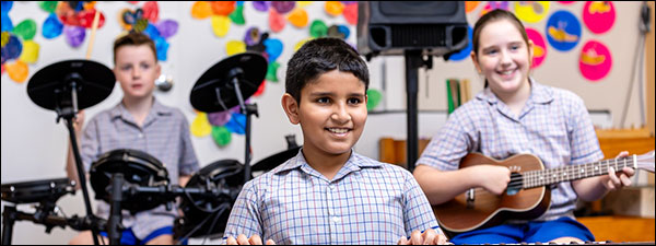 Students playing musical instruments